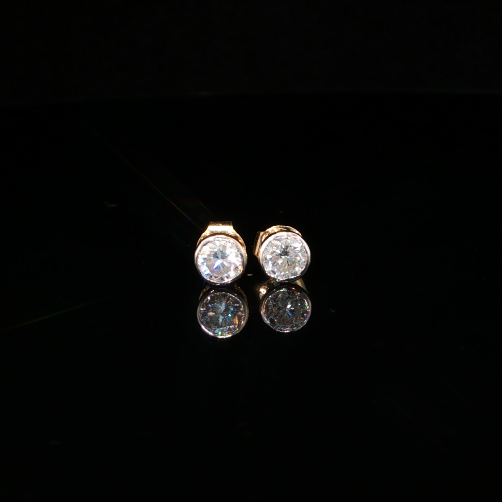 0.87 CTW Round Brilliant Cut Lab-Grown Diamond Bezel Stud Earrings in 14K Yellow Gold