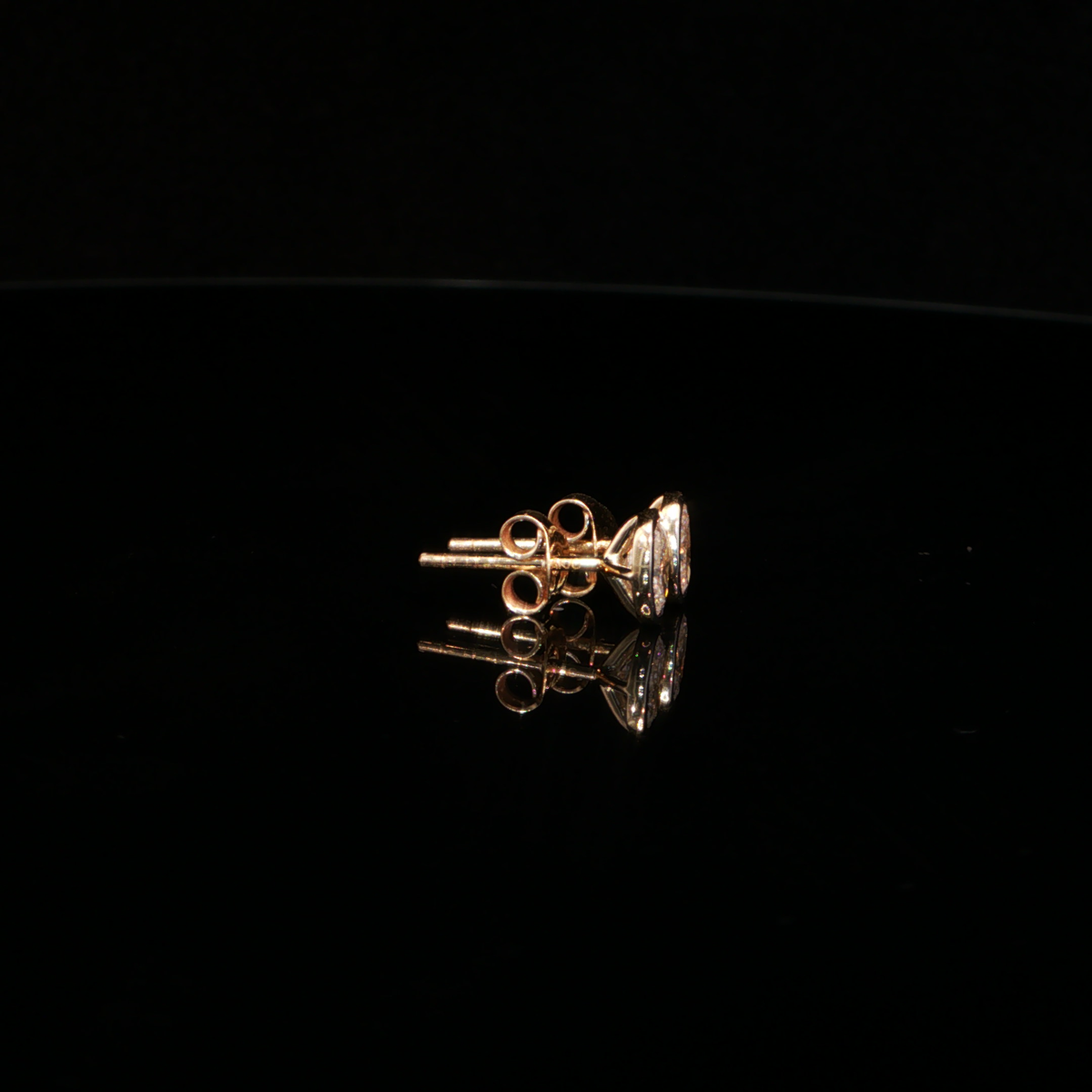 0.77 CTW Oval Cut Lab-Grown Diamond Bezel Stud Earrings in 14K Yellow Gold