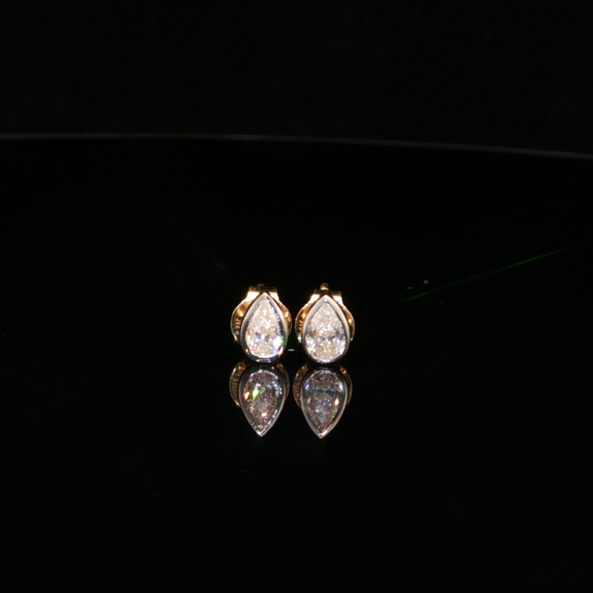 0.47 CTW Pear Cut Lab-Grown Diamond Stud Earrings in 14K Yellow Gold