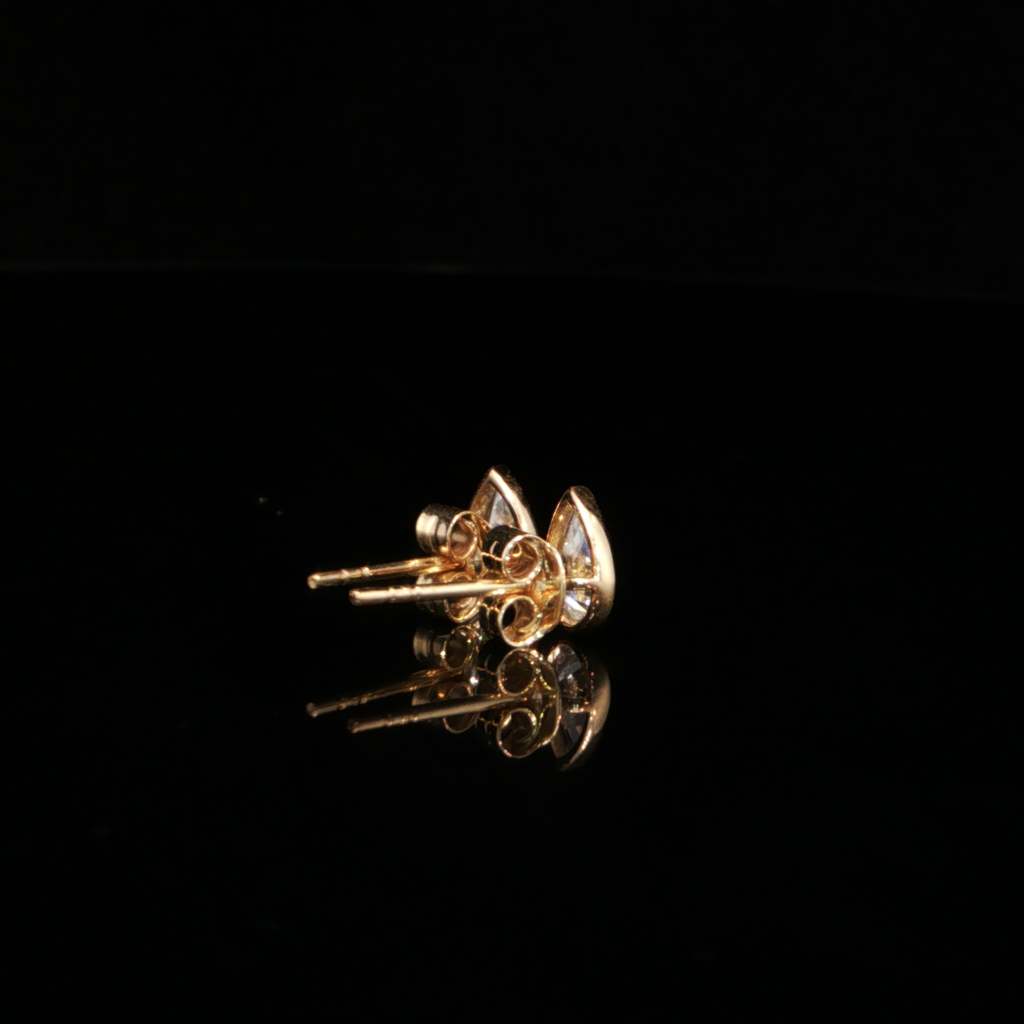 0.84 CTW Pear Cut Lab-Grown Diamond Bezel Stud Earrings in 14K Yellow Gold