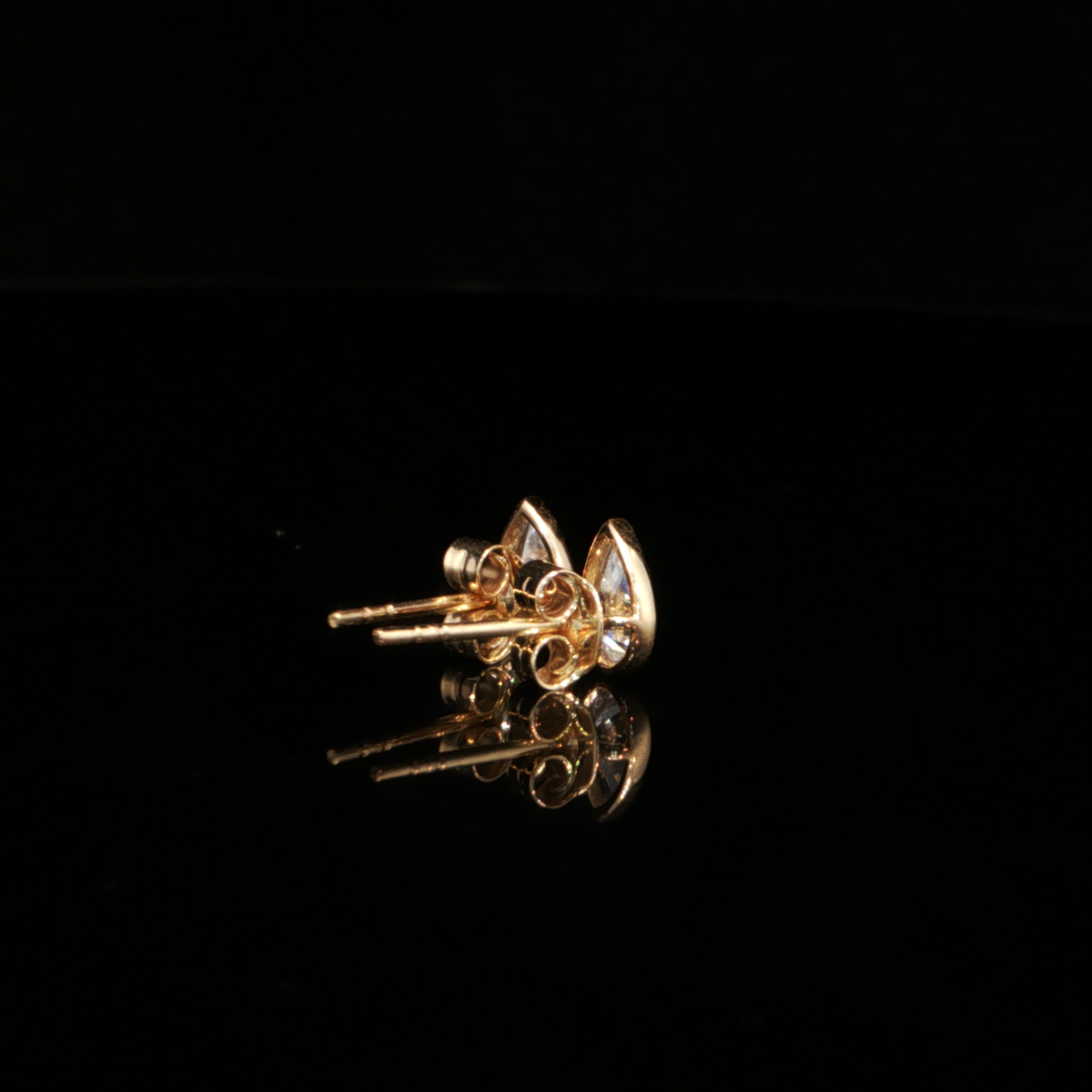 0.84 CTW Pear Cut Lab-Grown Diamond Bezel Stud Earrings in 14K Yellow Gold