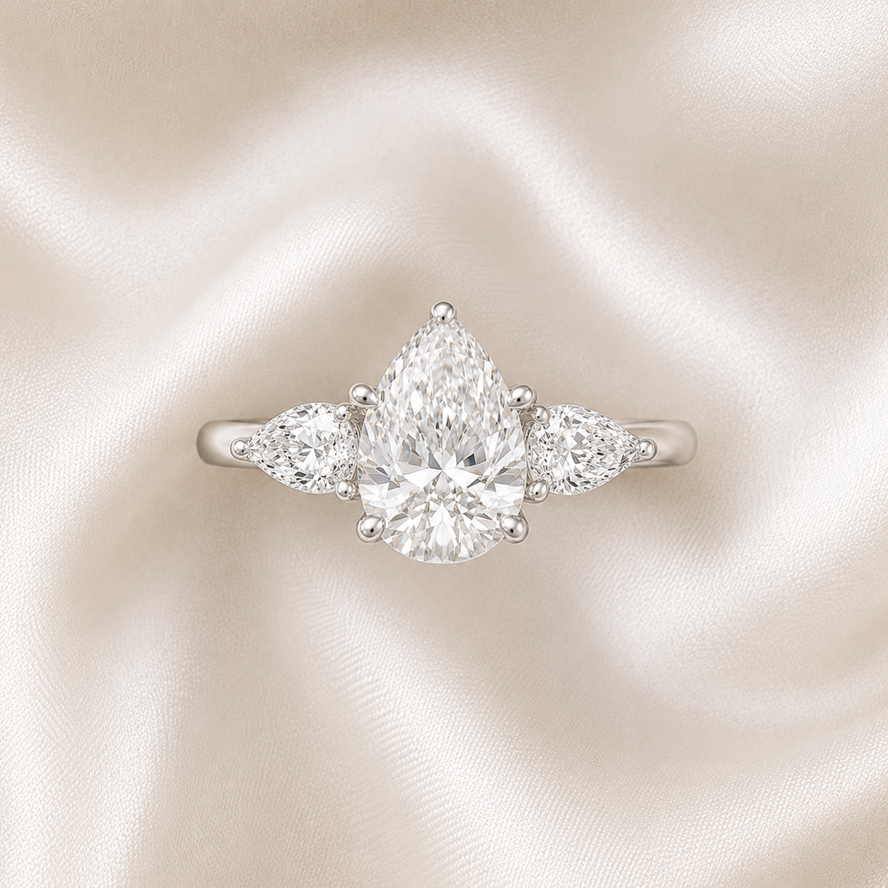 Three Stone Pear Engagement Ring