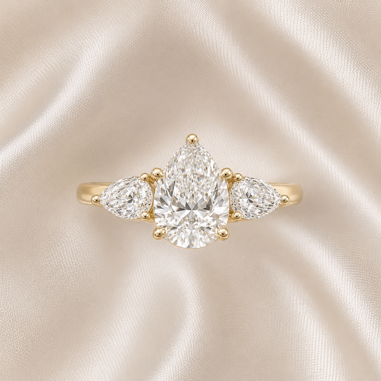 Three Stone Pear Engagement Ring