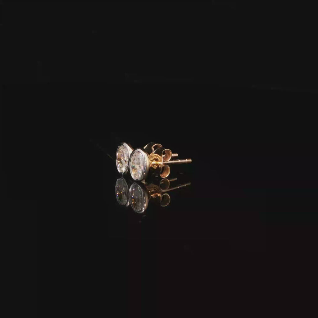 0.77 CTW Oval Cut Lab-Grown Diamond Bezel Stud Earrings in 14K Yellow Gold